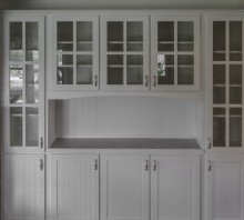 White lacquered Maple Built-in display cabinets with lower storage and laminate counter, Fortuna, CA
